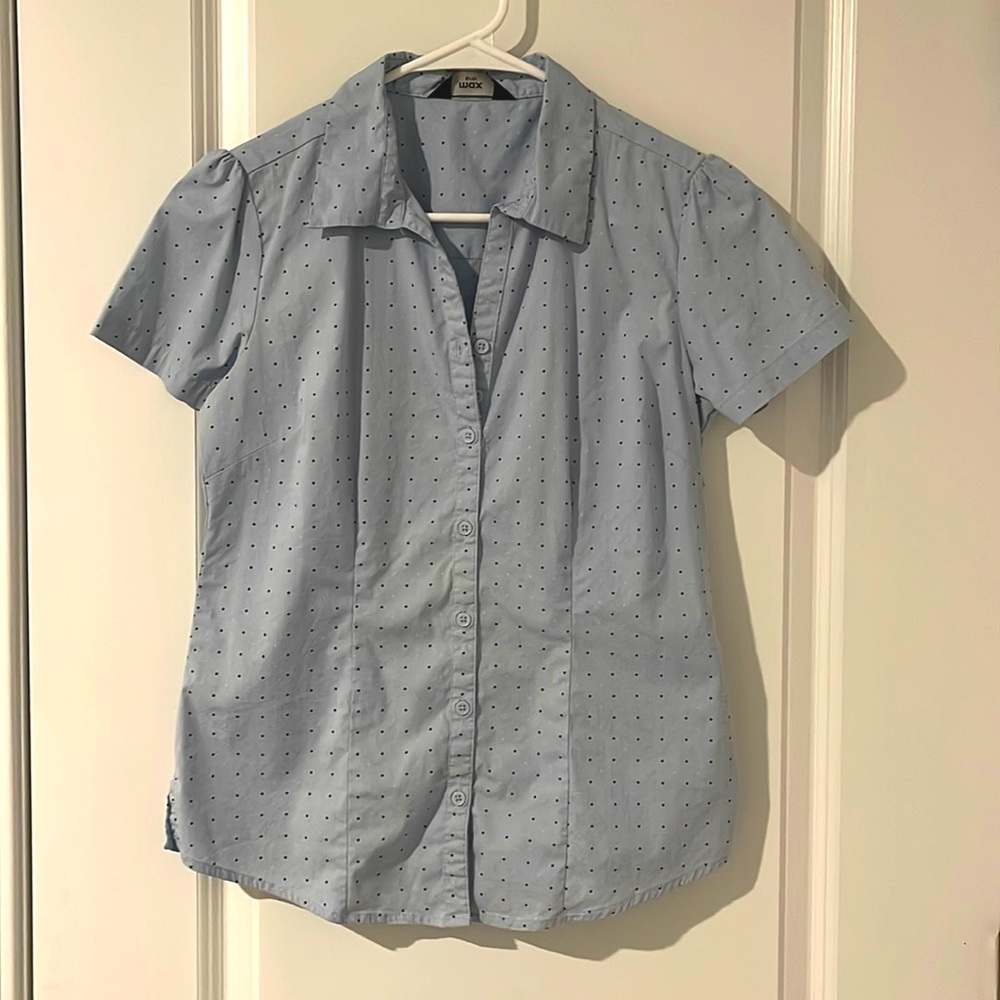 A formal shirt with white and black dots